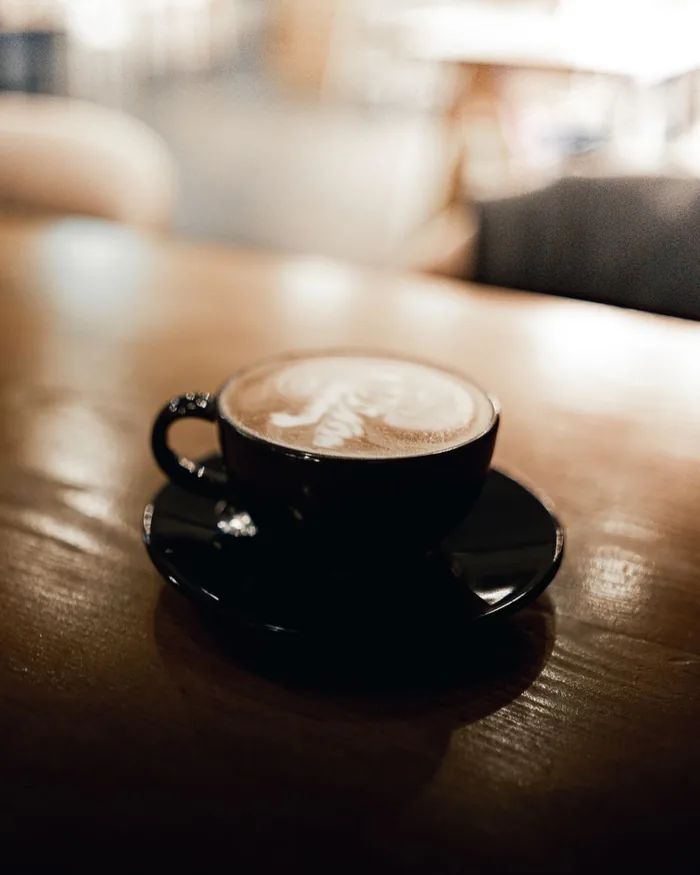 Latte with a rosetta poured on top