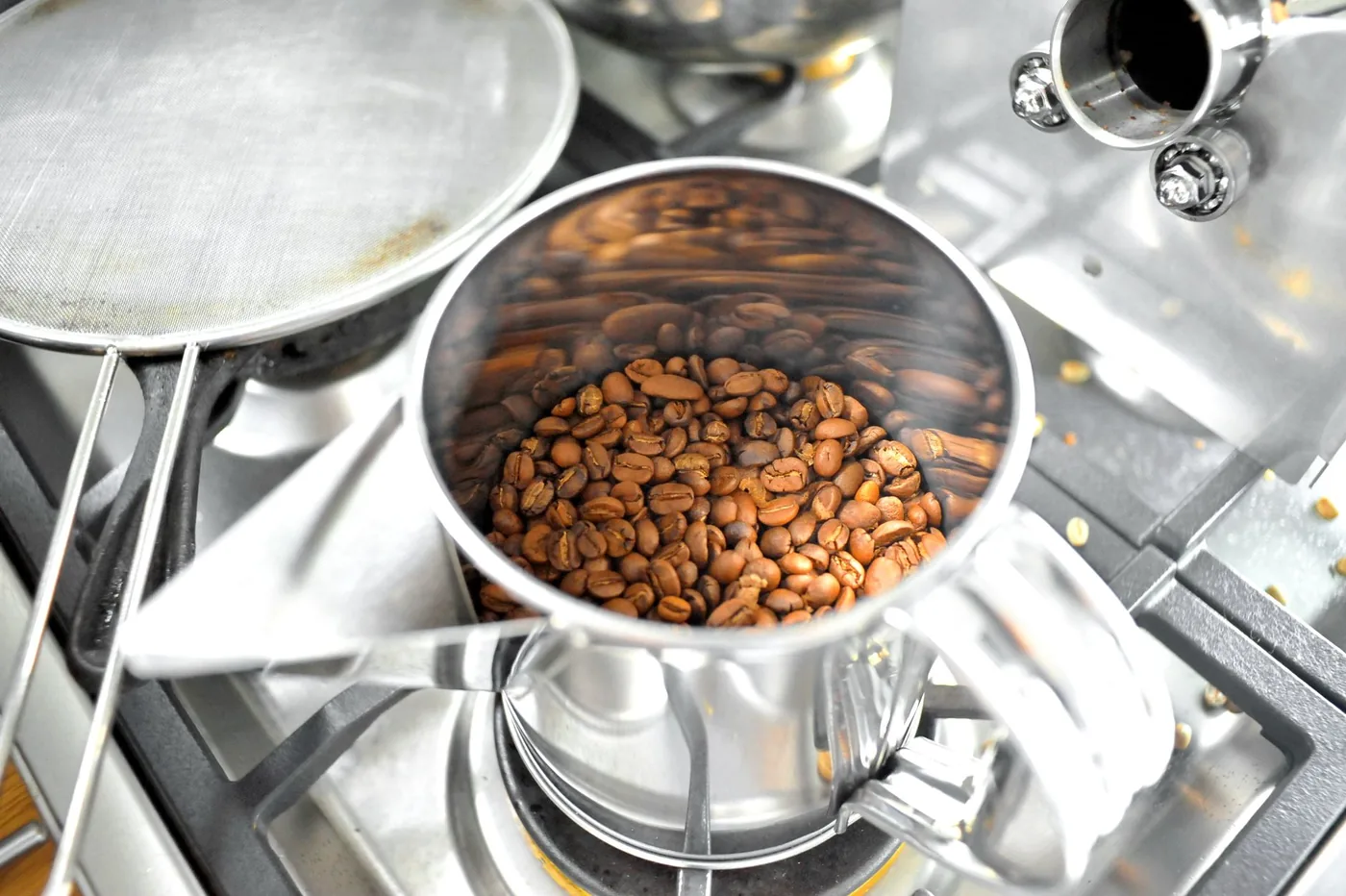 Beans turning in the roaster drum