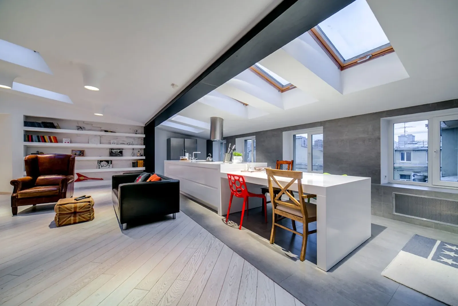 A finished open plan kitchen extension with rooflights and a steel beam
