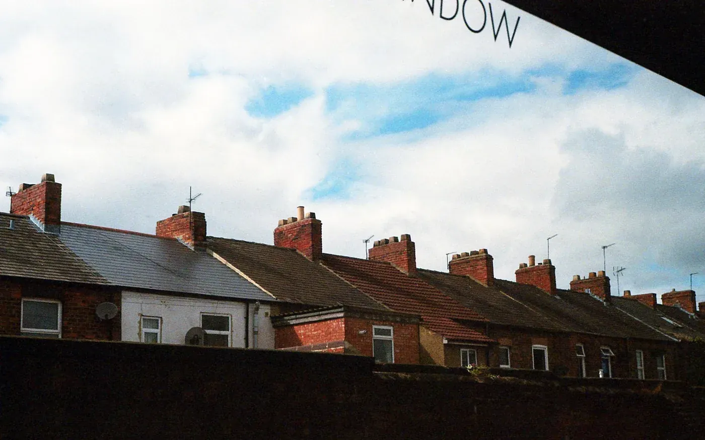 A row of Sheffield terraced houses and their roofs