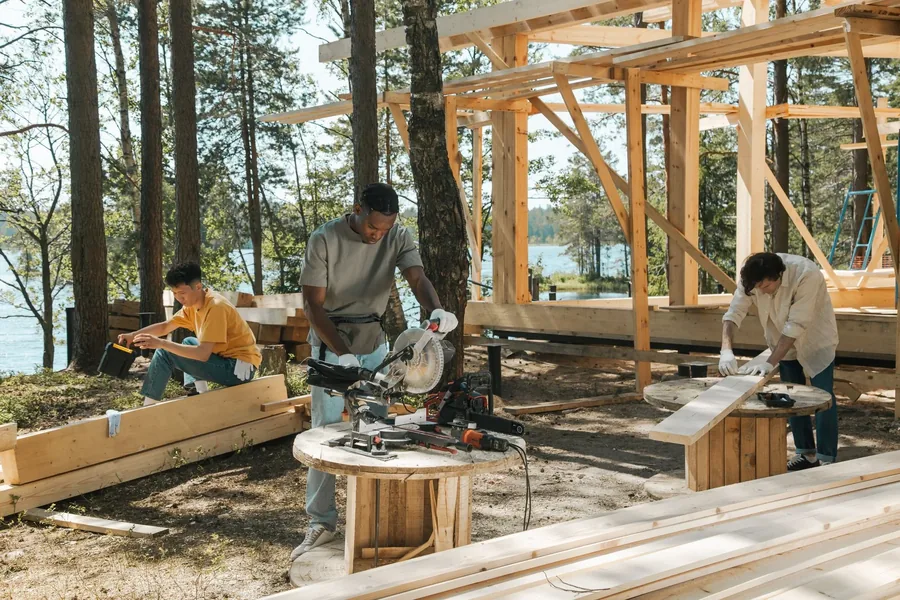 A crew framing a deck