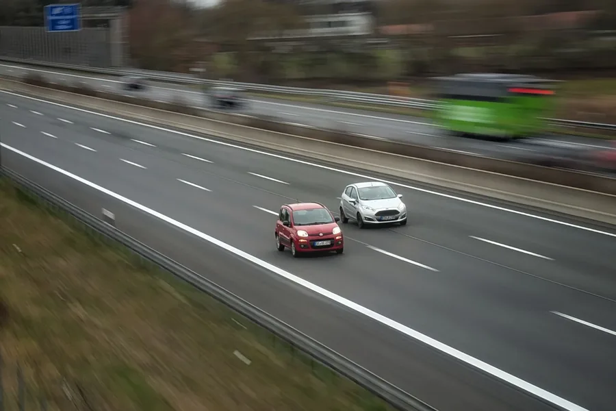 Cars merging on a highway