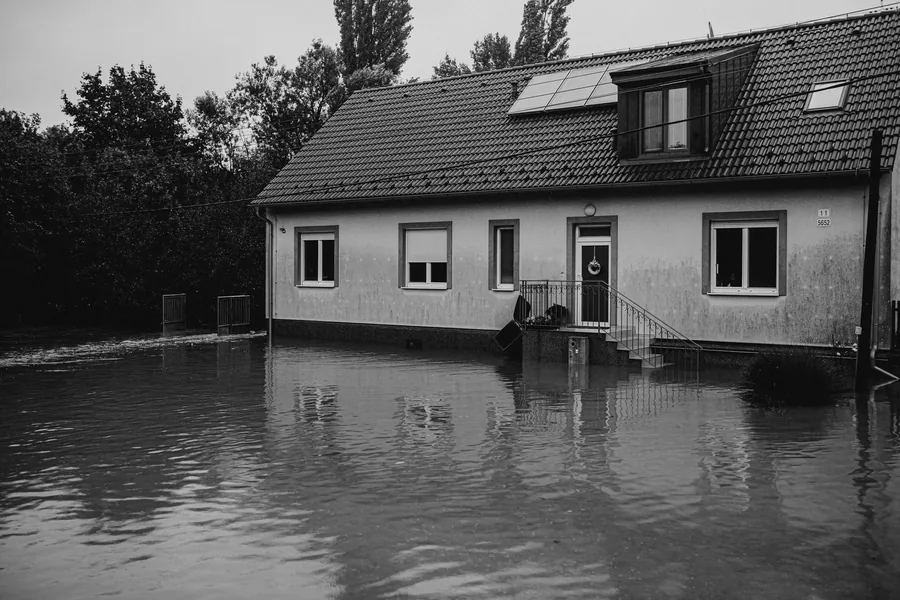 A house surrounded by flood water