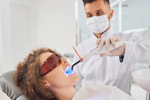 Patient receiving a teeth whitening treatment