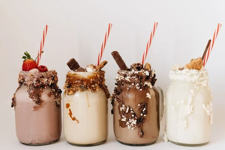 Four hand-spun milkshakes in jars