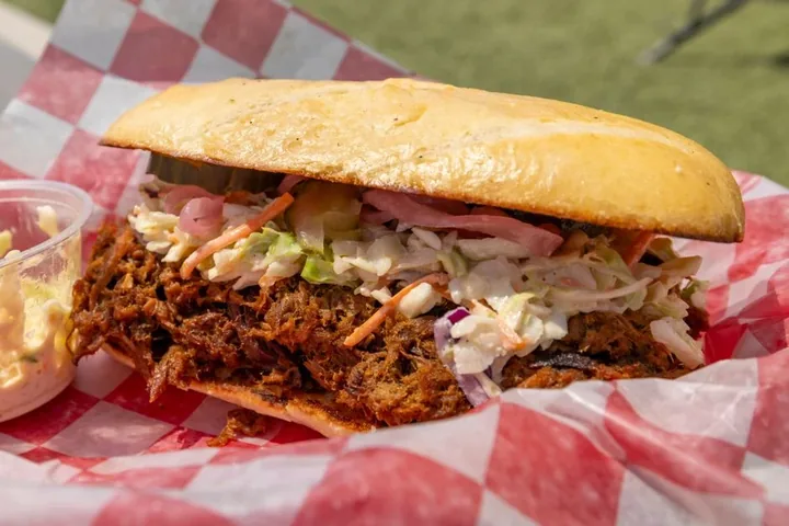 Pulled pork roll with slaw in a basket