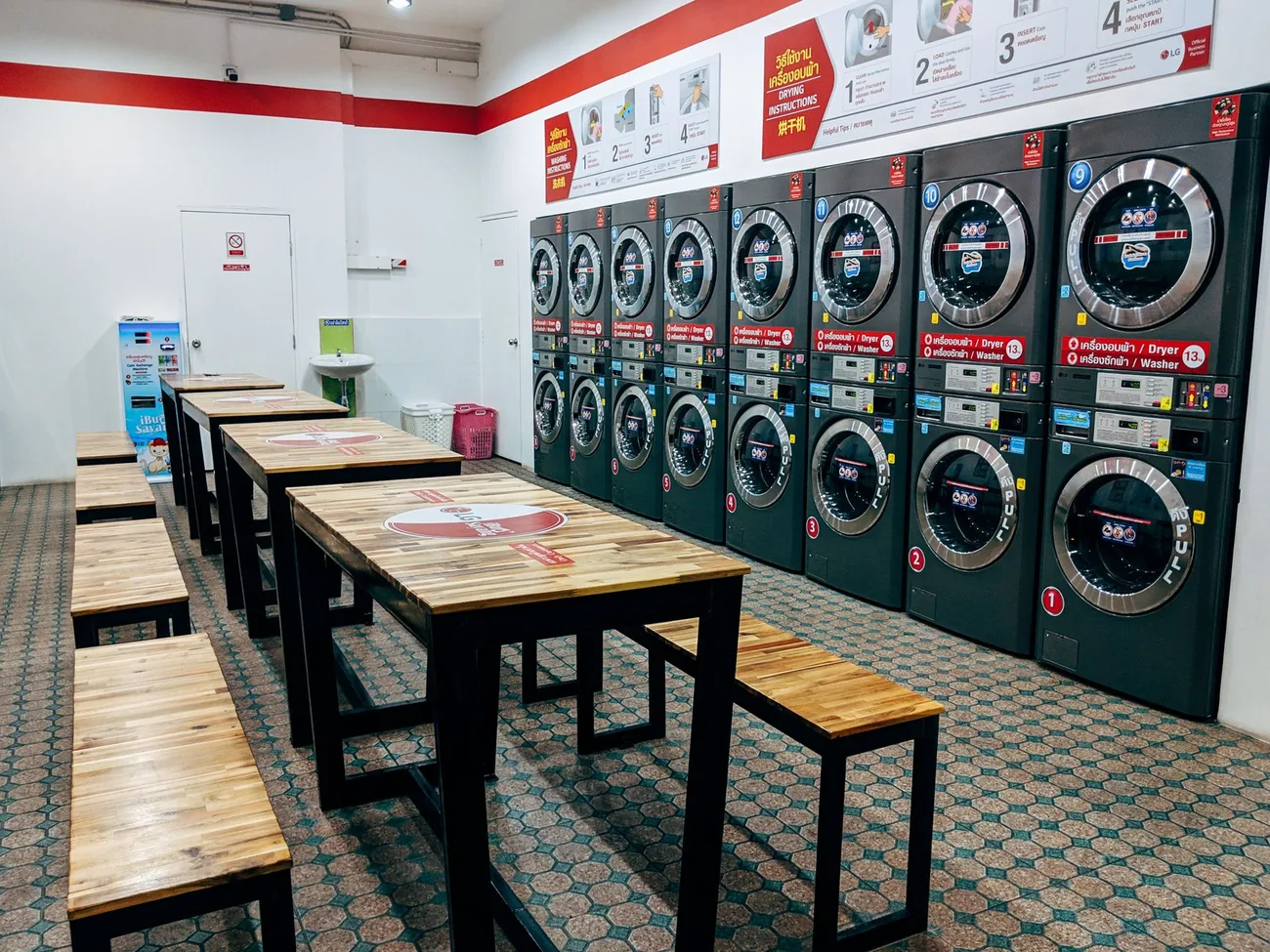 Seating and folding tables in a laundromat