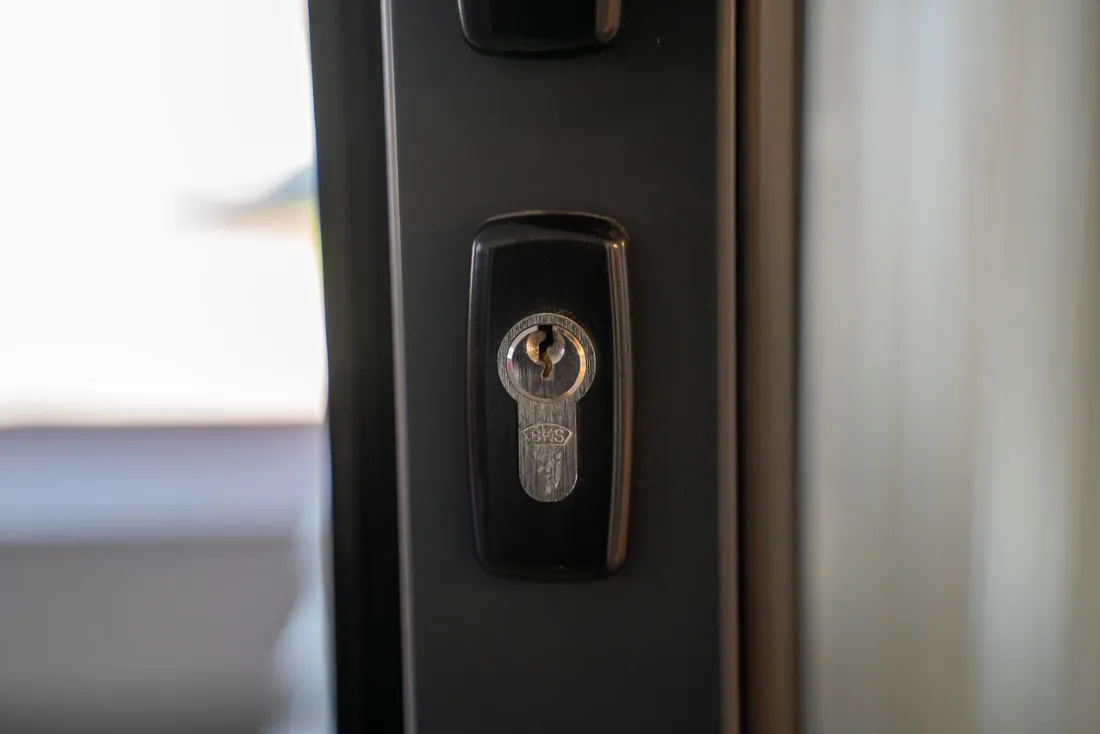 A euro cylinder lock in a modern front door