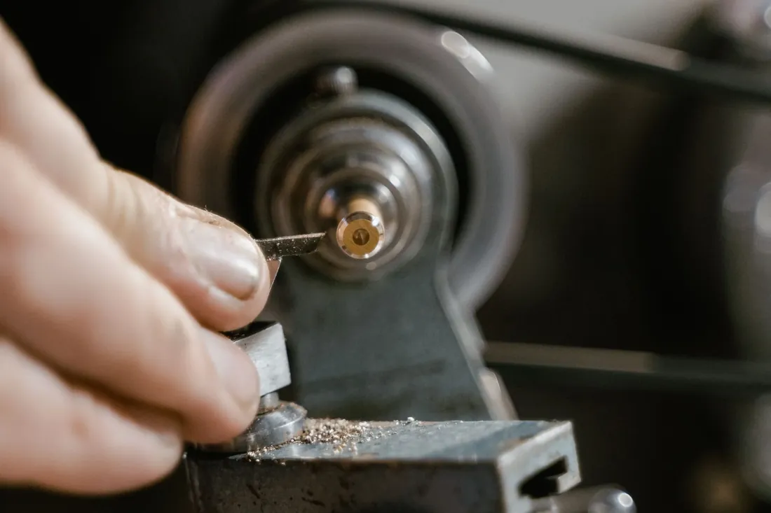 A key being cut on a key cutting machine
