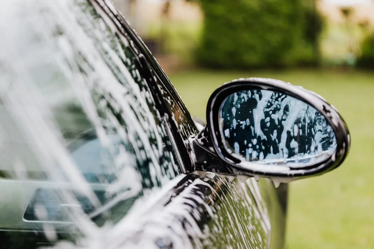 Foam running down a car mirror