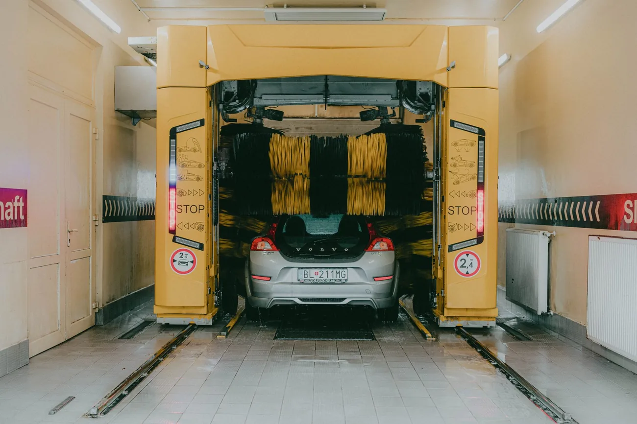 A car emerging clean from the tunnel