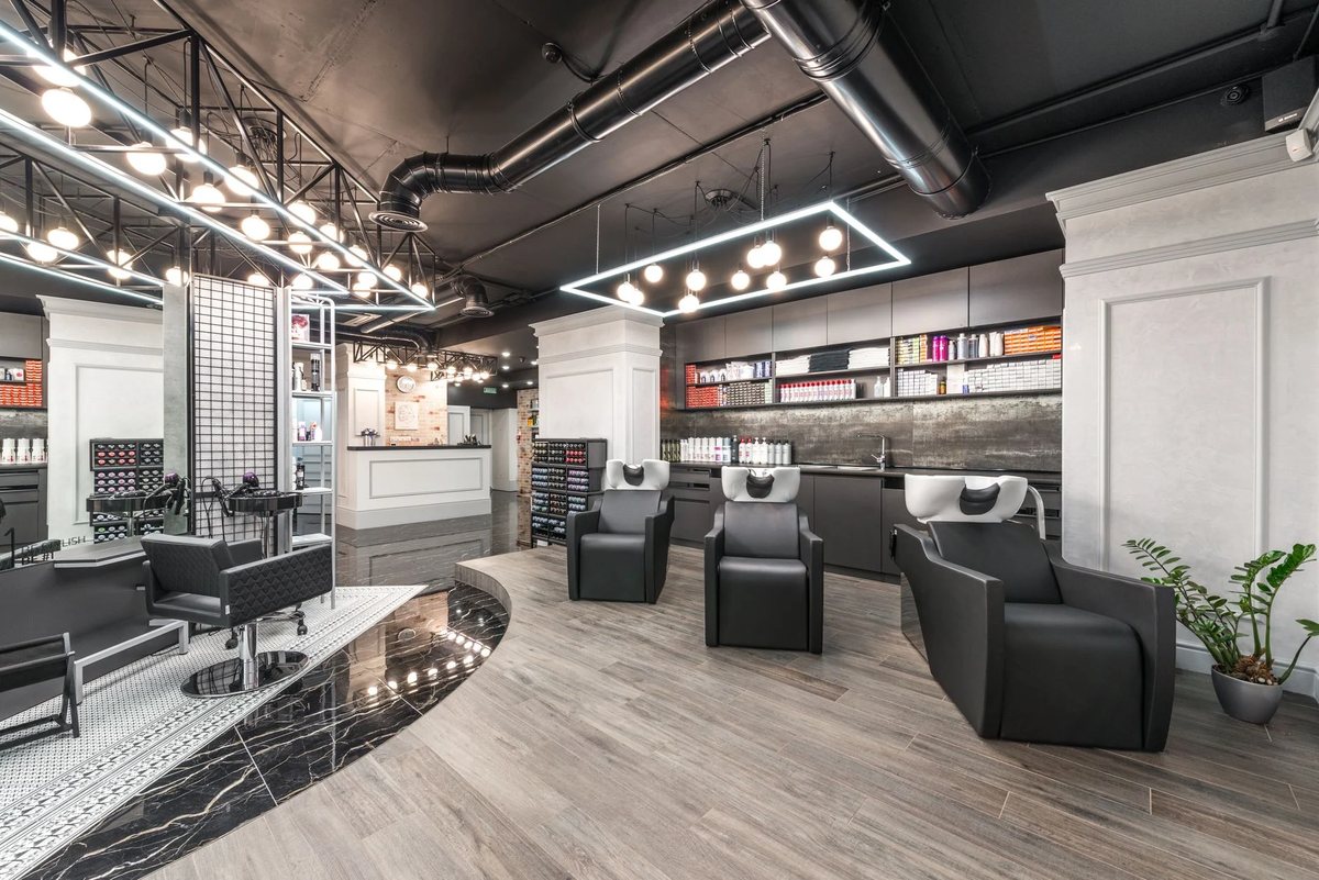 The salon floor with styling chairs and mirrors