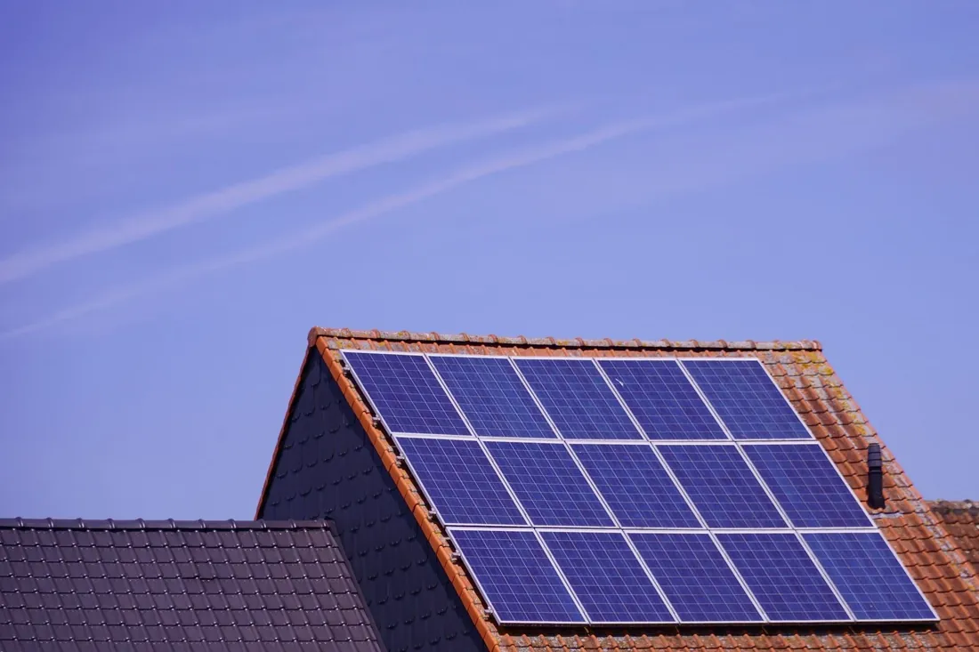 Solar panels on a terracotta tile roof