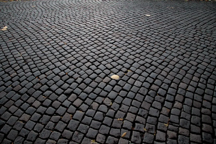 Dark granite setts laid in rows
