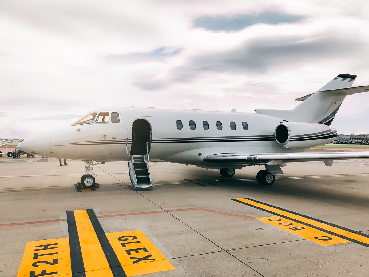 Private jet on a runway at dusk