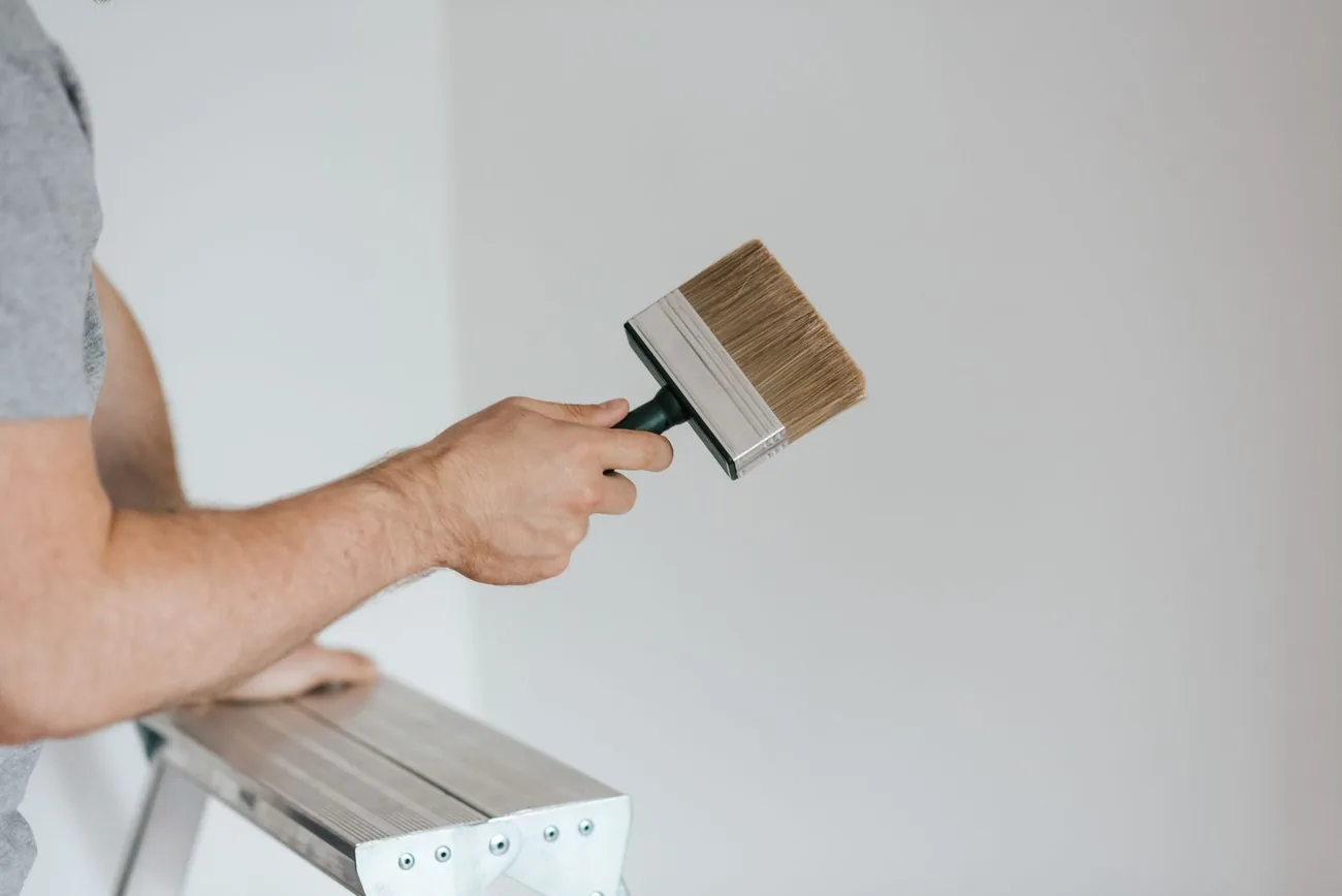 Brush cutting in a clean edge against a ceiling